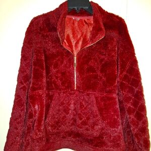 Warm, furry pull over